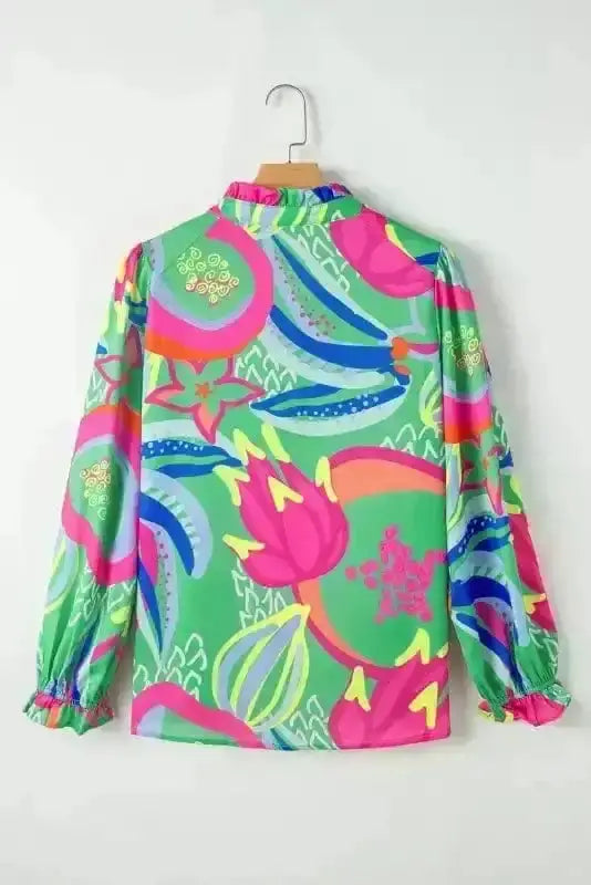 Back view of Abstract Print Button-Up Elegant Blouse showing long sleeves and relaxed silhouette — Fashionfitz