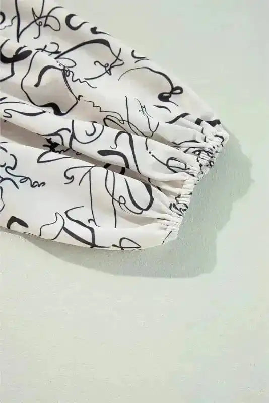 Blouses Abstract Elegance Puffed Sleeve Blouse