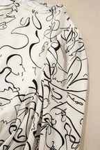Blouses Abstract Elegance Puffed Sleeve Blouse