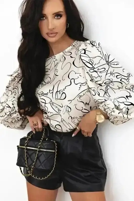Close-up of Abstract Print Balloon Sleeve Blouse showing warm beige abstract pattern and balloon sleeve gathering — Fashionfitz