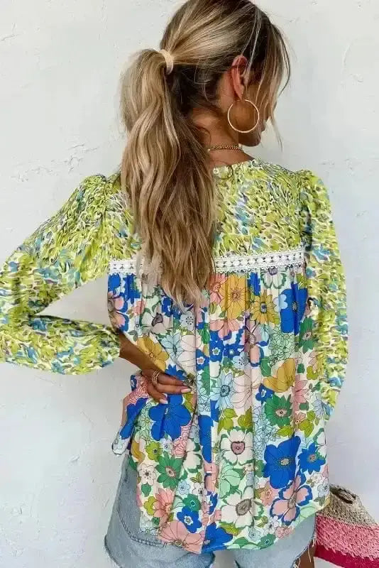 Back view of Green Floral Puff Sleeve Spring Blouse showing boat neckline and fluid viscose drape — Fashionfitz