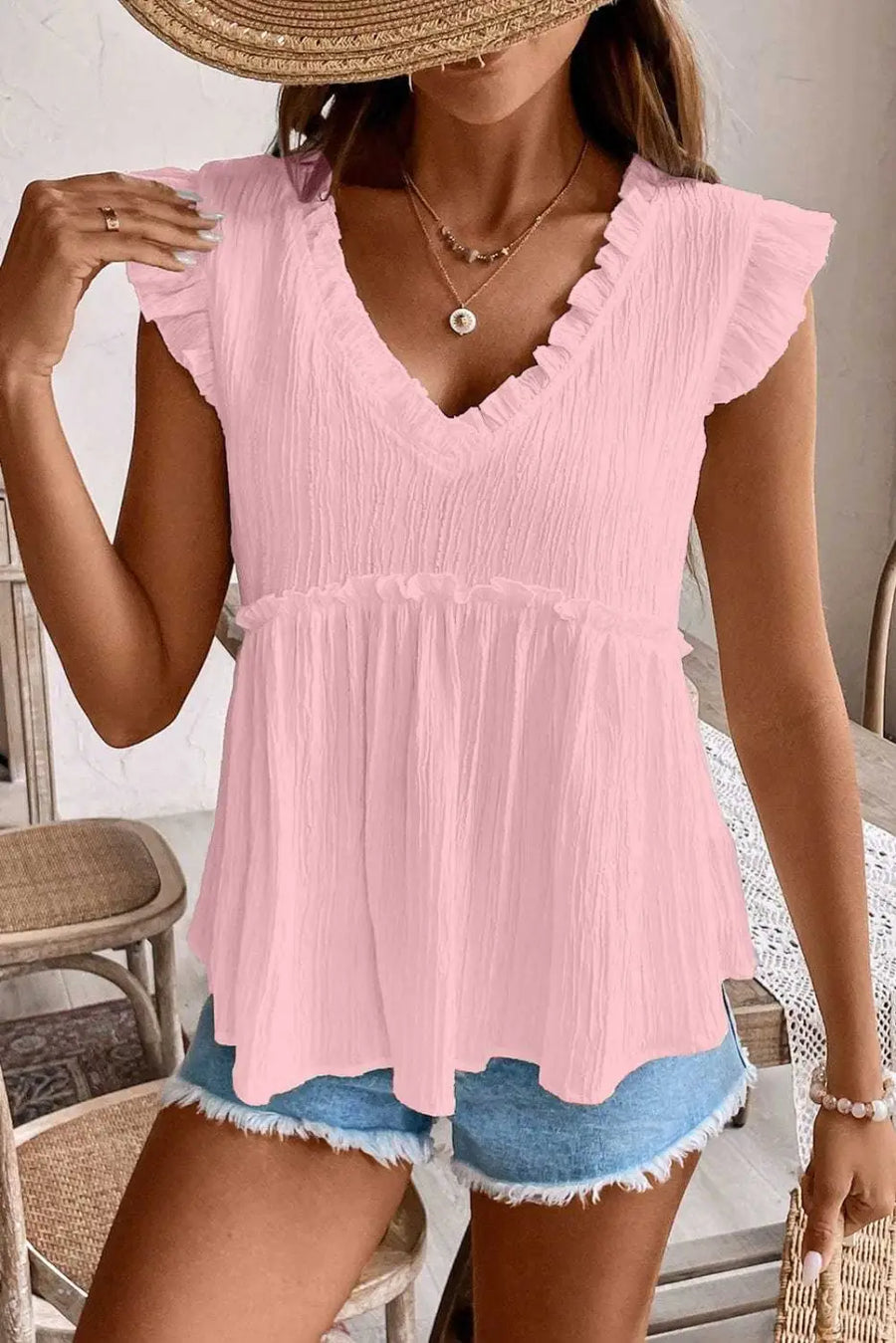 Side view of Pink Ruffle Trim Flowy Top showing flowing, feminine silhouette and V-neckline — Fashionfitz