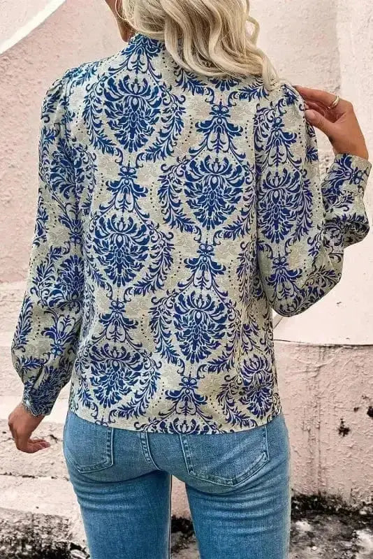 Back view of Blue Boho Lace Splicing Floral Blouse showing split V-neckline and relaxed silhouette — Fashionfitz