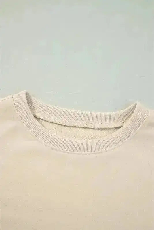 Close-up of Solid Colour Cascading Ruffle Blouse showing graceful tiered ruffle construction in refined jet stream blue-grey — Fashionfitz