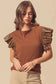 Blouses Cinnamon Ruffle Blouse – Chic Leather Sleeve Statement