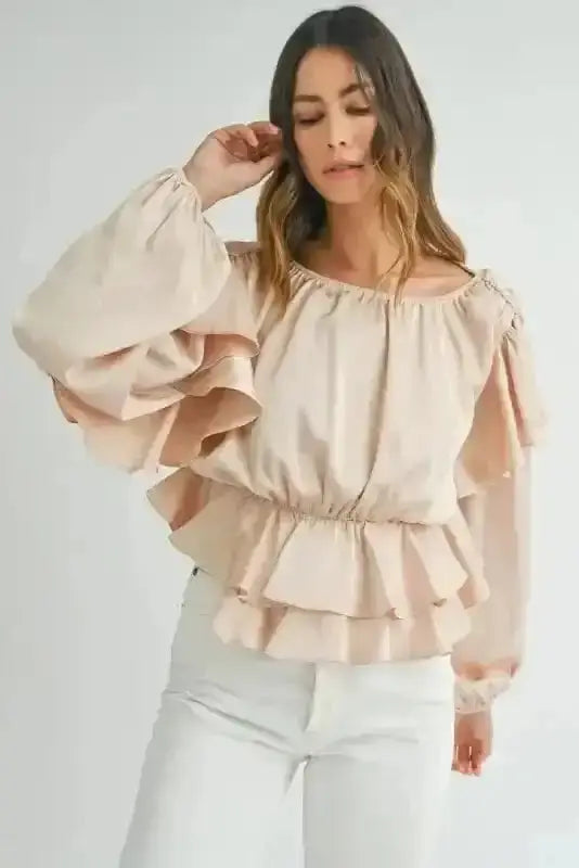 Close-up of Elegant Ruffled Peplum Keyhole Back Blouse showing keyhole back opening and ruffled detail on oatmeal fabric — Fashionfitz