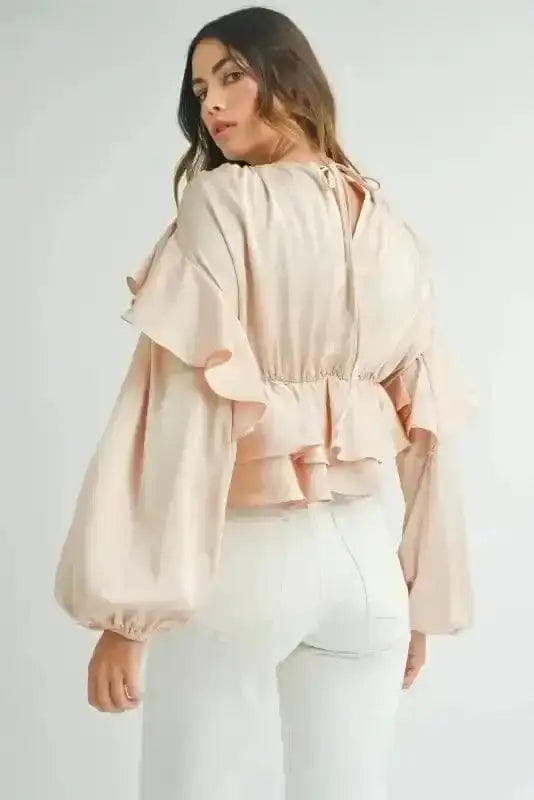 Back view of Elegant Ruffled Peplum Keyhole Back Blouse showing distinctive keyhole back detail and long sleeve — Fashionfitz