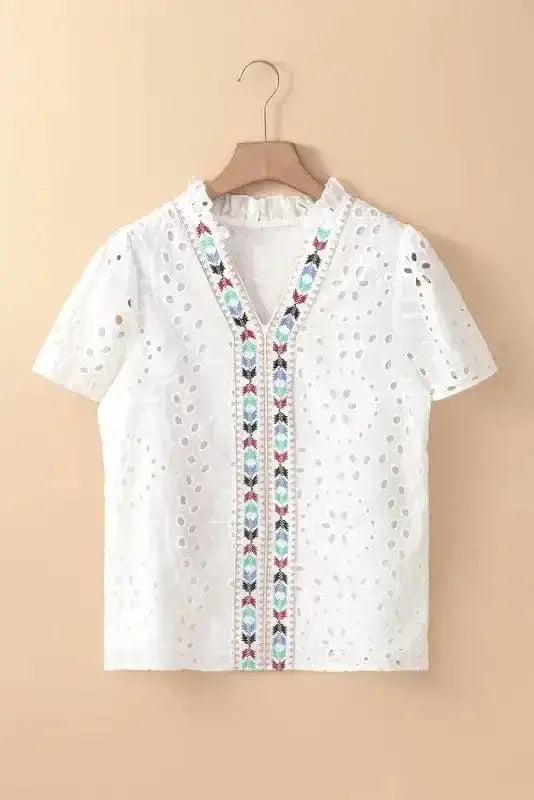 White Aztec Embroidered V-Neck Peekaboo Blouse Women UK styled as a boho holiday vacation outfit — Fashionfitz
