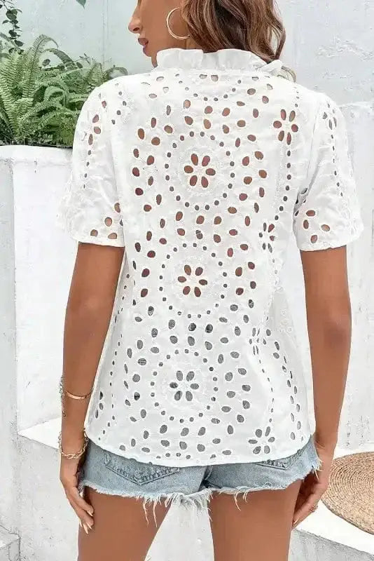 Back view of Aztec Embroidered Peekaboo Blouse showing flutter sleeve detail and relaxed cotton silhouette — Fashionfitz