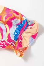 Blouses Ethereal Patterns Ruffled V-Neck Blouse