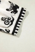 Blouses Geometric Glamour Quarter-Sleeve Top