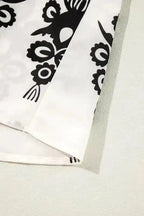 Blouses Geometric Glamour Quarter-Sleeve Top