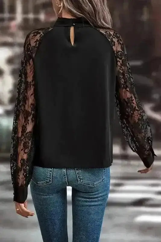 Back view of Black Lace Sleeve V-Neck Blouse showing long lace sleeve silhouette and elegant neckline — Fashionfitz