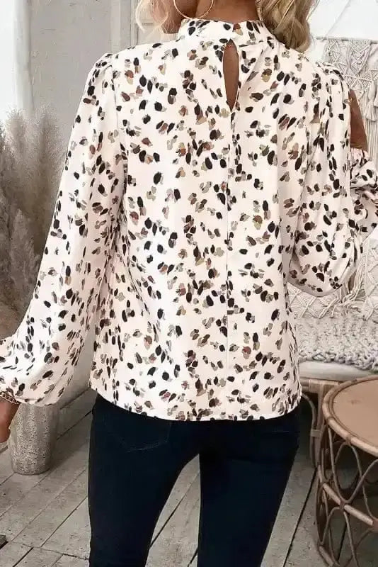 Back view of Leopard Print Mock Neck Puff Sleeve Pleated Blouse showing long lantern sleeve and pleated silhouette — Fashionfitz