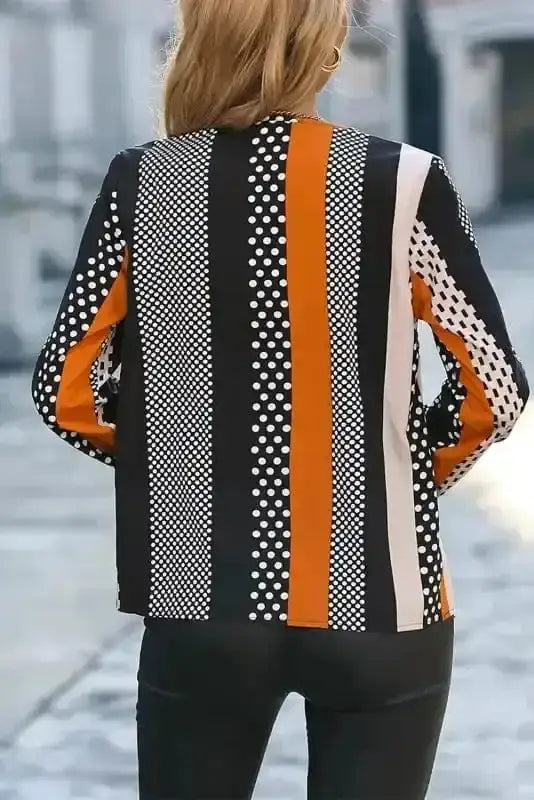 Back view of Geometric Colour Block Notch V-Neck Blouse showing long sleeve silhouette and relaxed fit — Fashionfitz