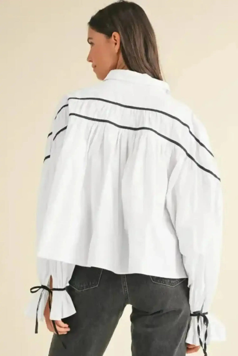 Back view of Monochrome Striped Bowtie Cotton Ruffle Blouse showing long sleeve silhouette and shirt collar — Fashionfitz