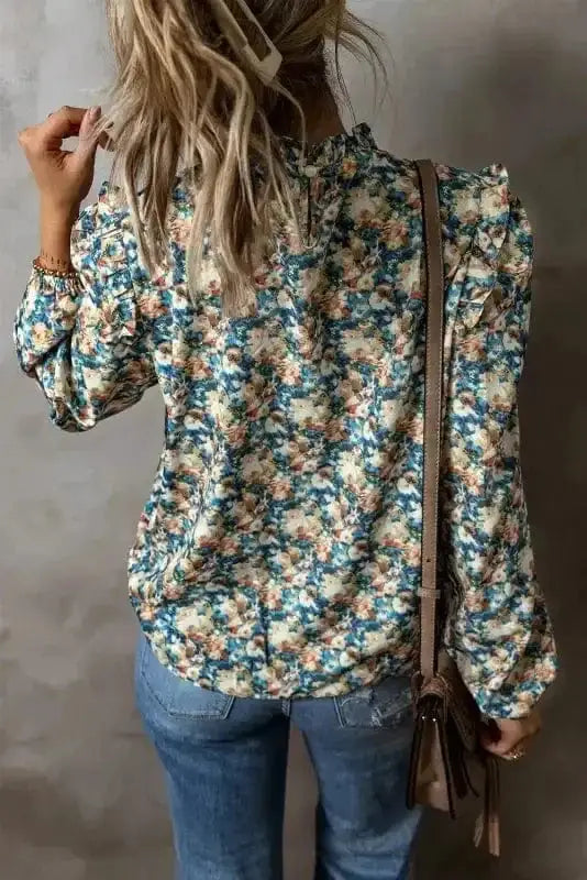 Back view of Floral Petal Print Puff Sleeve Blouse showing frilled round neckline and long sleeve detail — Fashionfitz