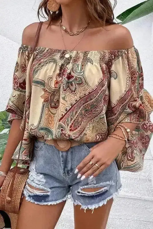 Close-up of Boho Paisley Shirred Blouse showing vibrant apricot paisley print and ruffled sleeve detail — Fashionfitz