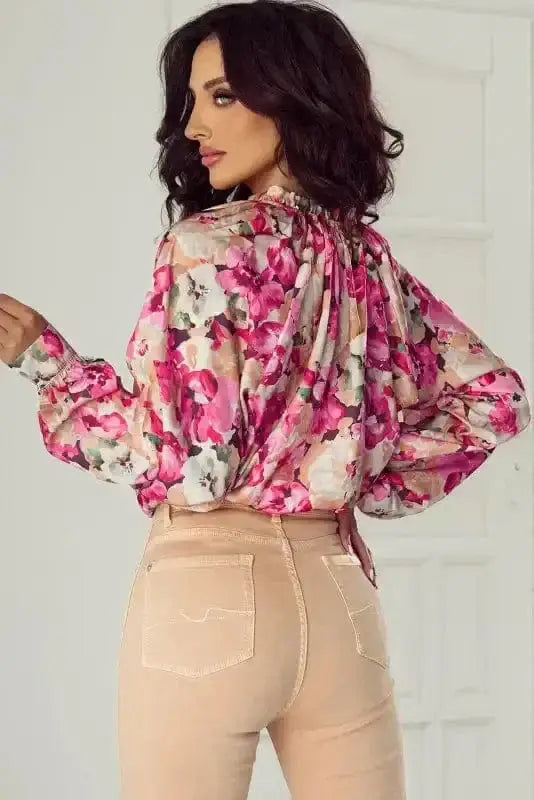 Back view of Pink Floral Ruffle Accent Flowy Blouse showing flowing silhouette and long sleeve detail — Fashionfitz