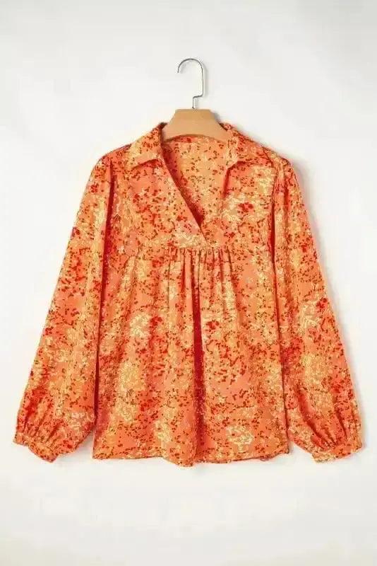 Side view of Abstract Print Babydoll Blouse showing V-neckline and shirred bodice flare — Fashionfitz