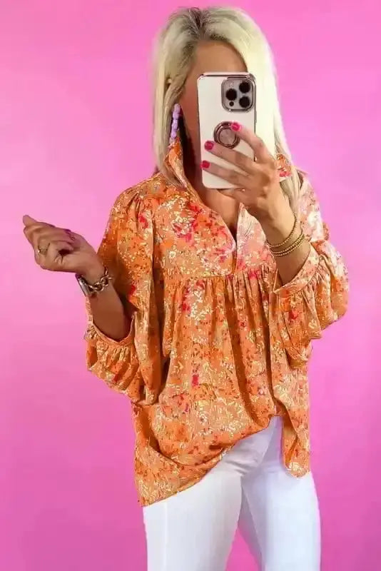 Back view of Abstract Print V-Neck Babydoll Blouse showing flowing shape and long sleeve detail — Fashionfitz