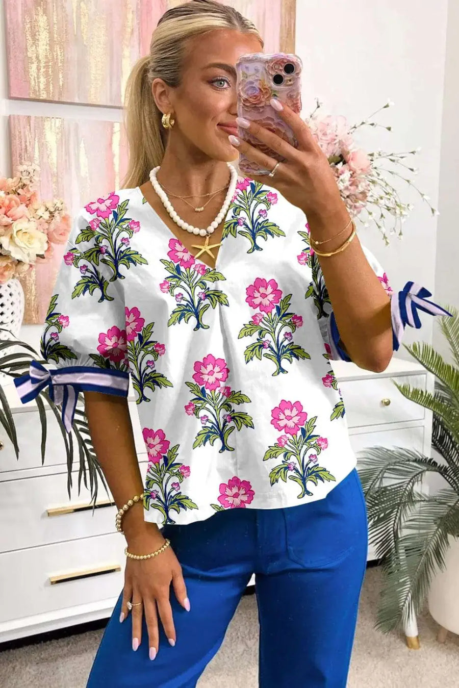 Side view of White Floral Bubble Sleeve Blouse showing rounded bubble sleeve shape and V-neckline — Fashionfitz