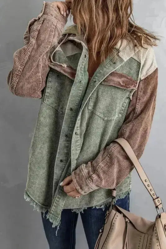 Close-up of corduroy texture and colour block detail on hooded button-down jacket Fashionfitz UK