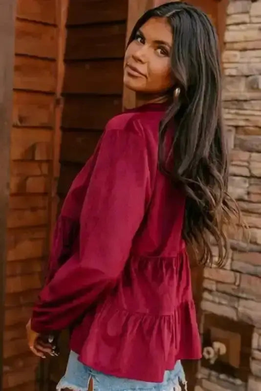 Side view of Red Corduroy Ruffle Blouse showing ruffled detail and ribbed corduroy fabric texture — Fashionfitz