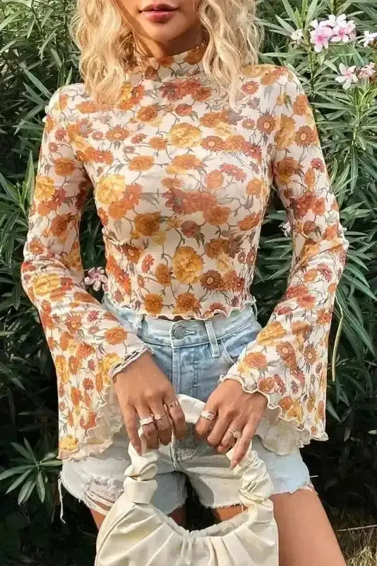 Close-up of Floral Bell Sleeve Crop Top showing vibrant orange floral print and delicate scallop trim detail — Fashionfitz