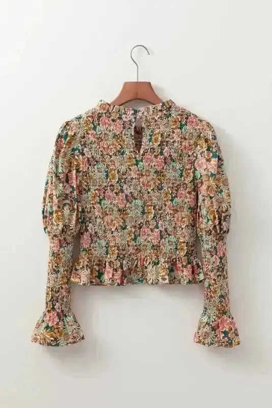 Close-up of Floral Smocked Bubble Sleeve Crop Top showing vibrant yellow floral print on 100% cotton and smocked detail — Fashionfitz