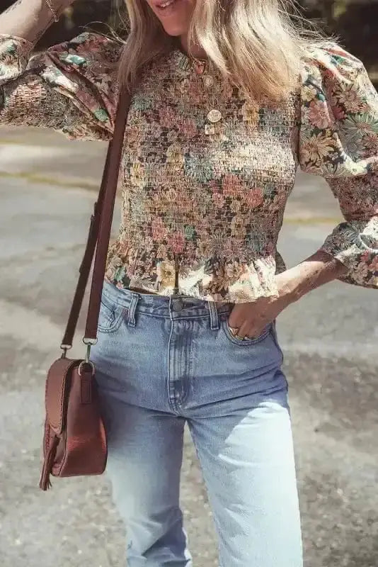 Side view of Floral Smocked Bubble Sleeve Crop Top showing smocked chest panel and bubble sleeve shape — Fashionfitz