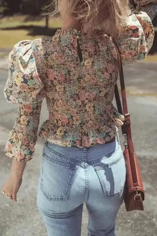 Back view of Floral Smocked Bubble Sleeve Crop Top showing bubble sleeve structure and cropped 100% cotton silhouette — Fashionfitz