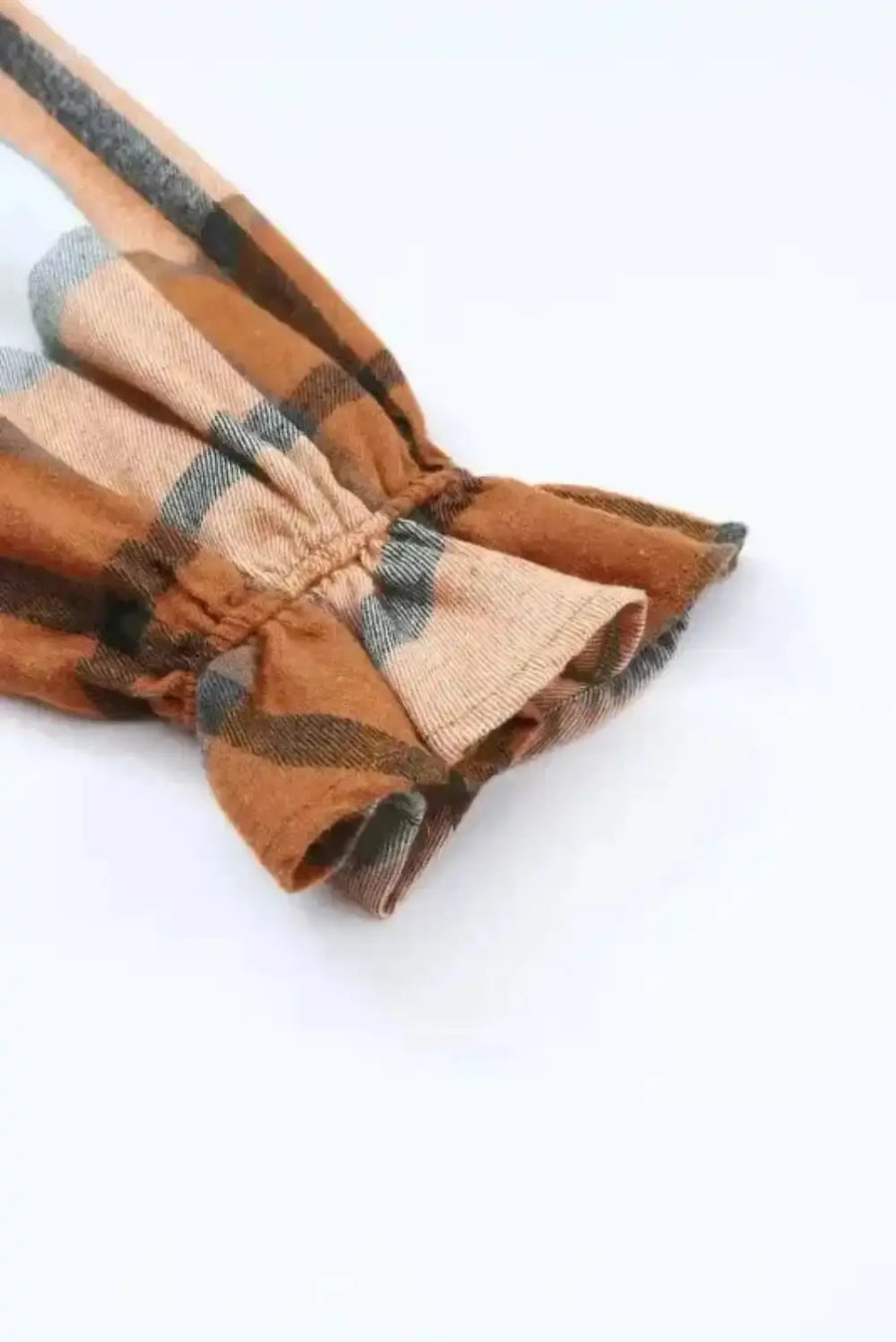 Flat lay of khaki plaid ruffled sleeve shirt dress showing plaid pattern and ruffled sleeve detail Fashionfitz UK