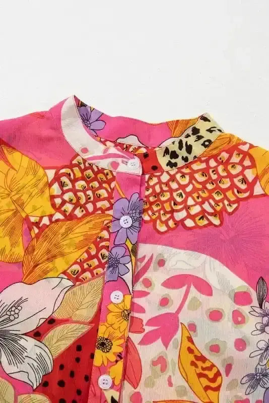 Back view of Orange Floral Bubble Sleeve Abstract Blouse showing long sleeve structure and shirred bodice — Fashionfitz
