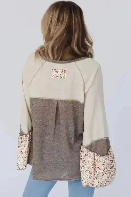 Back view of Floral Patchwork Henley Flared Sleeve Top showing henley neckline and long sleeve silhouette — Fashionfitz
