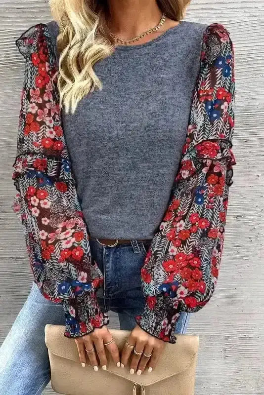 Close-up of Blue Sheer Floral Sleeve Colour Block Blouse showing delicate sheer floral sleeve fabric against rich blue body — Fashionfitz
