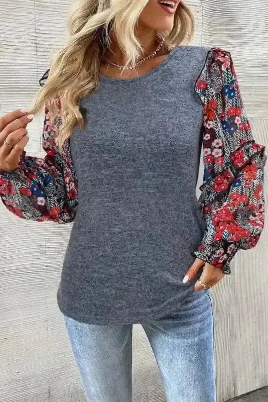 Side view of Blue Sheer Floral Sleeve Blouse showing semi-transparent floral sleeve detail and polyester-viscose drape — Fashionfitz
