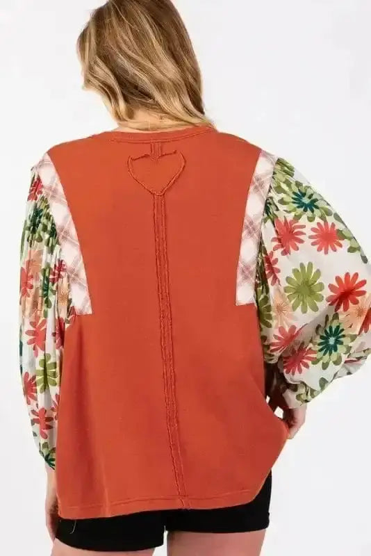 Side view of Orange Floral Puff Sleeve Spring Blouse showing puff sleeve structure and shirred bodice — Fashionfitz