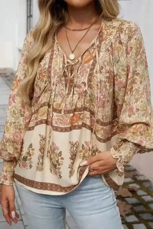 Side view of Floral Tie Neck Blouse showing bow tie detail and puff sleeve construction — Fashionfitz