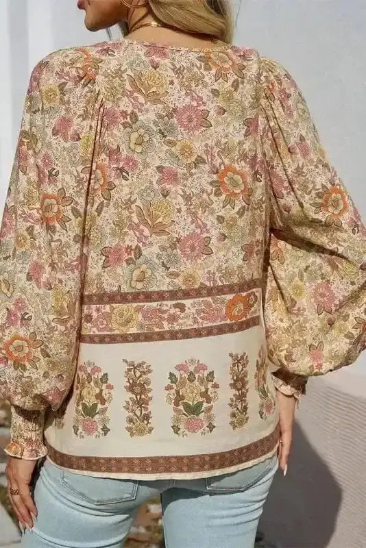 Back view of Floral Tie Neck Lightweight Blouse showing long sleeves and relaxed boho silhouette — Fashionfitz