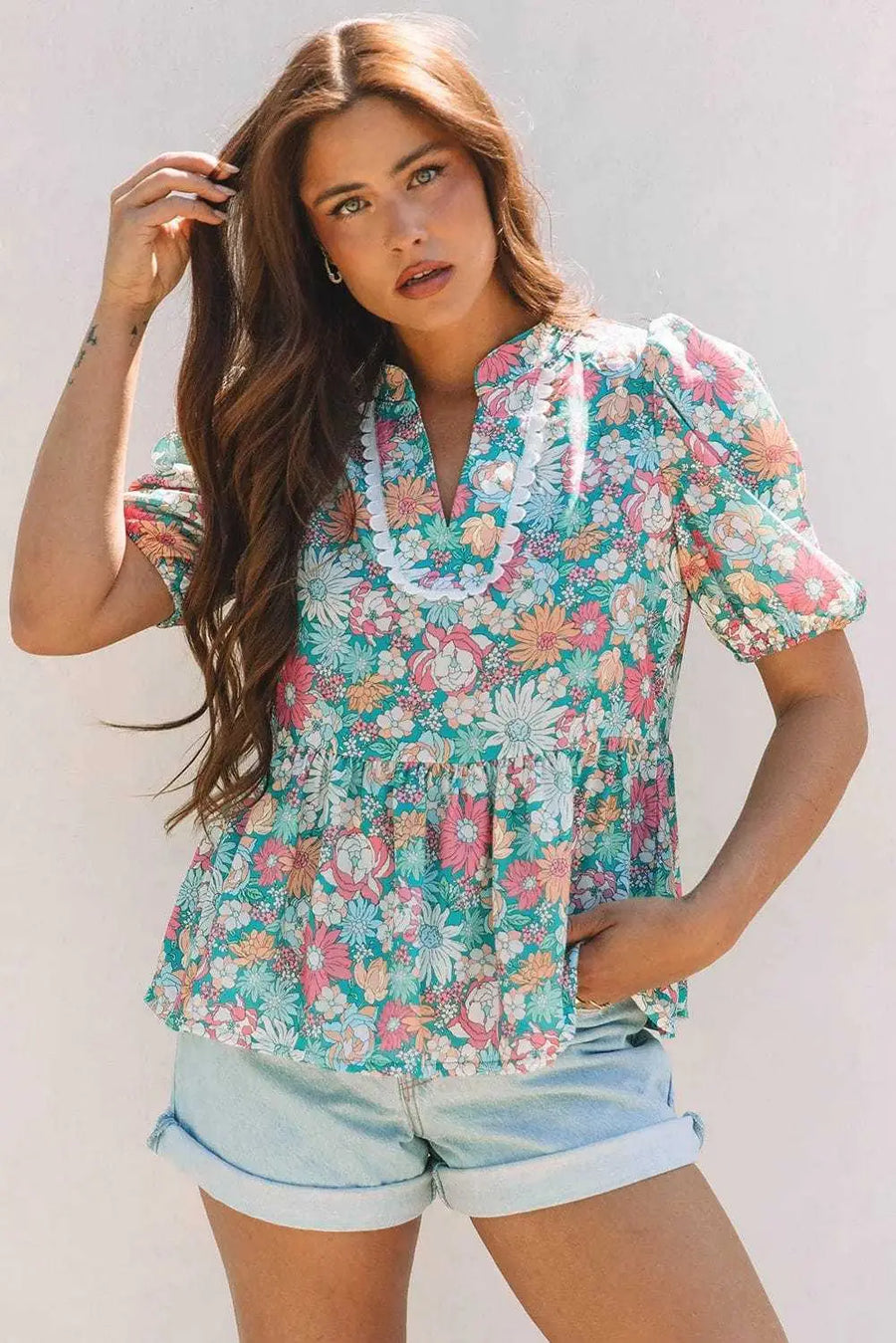 Close-up of Green Floral Puff Sleeve Blouse showing vibrant botanical floral print and puff sleeve shape — Fashionfitz