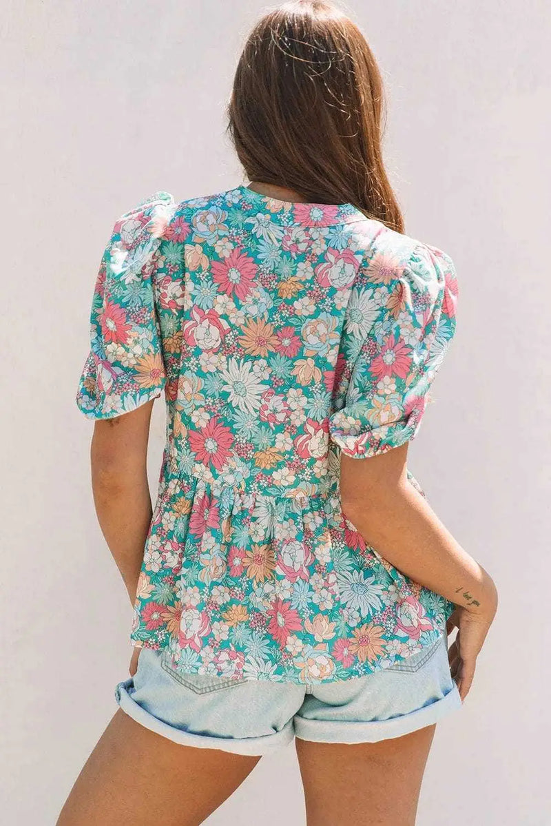 Back view of Green Floral Puff Sleeve Blouse showing relaxed shift silhouette and V-neckline — Fashionfitz