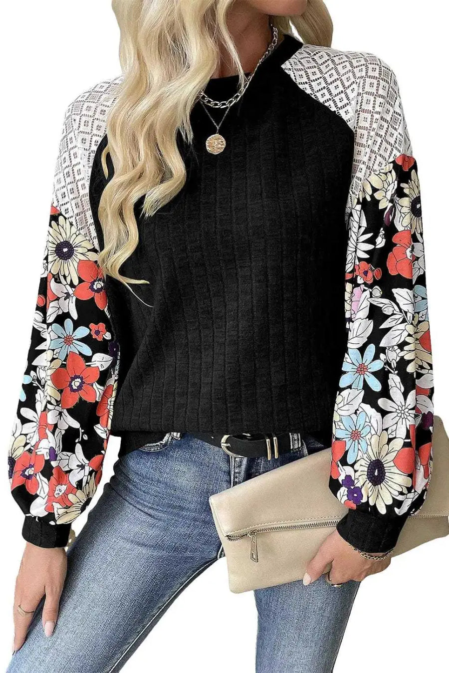 Close-up of Floral Sleeve Ribbed Patchwork Blouse showing floral sleeve patchwork detail against solid black ribbed body — Fashionfitz