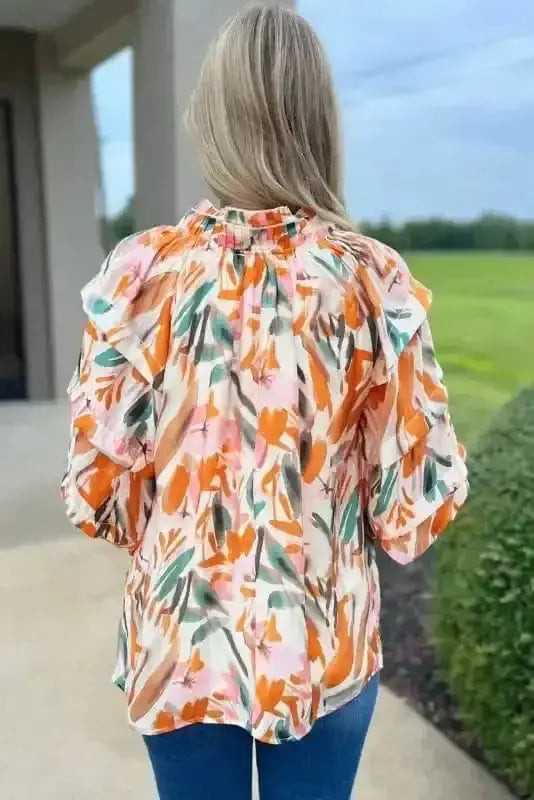 Back view of Abstract Frilled V-Neck 3/4 Sleeve Blouse showing puff sleeve detail and relaxed silhouette — Fashionfitz