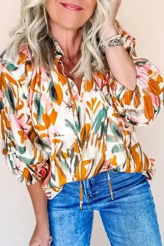 Abstract Frilled V-Neck 3/4 Sleeve Blouse Women UK — front view showing vibrant orange abstract print and frilled neckline — Fashionfitz