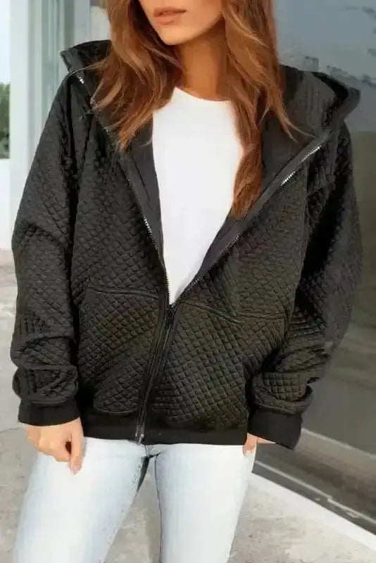 Black quilted hooded jacket with side pockets front view — Fashionfitz UK
