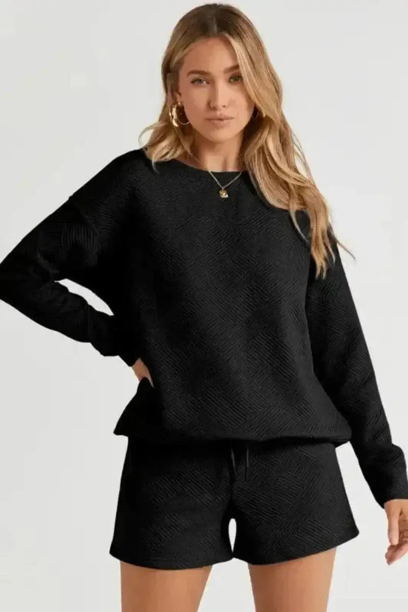 Close-up of black textured ribbed fabric on two-piece loungewear set Fashionfitz UK