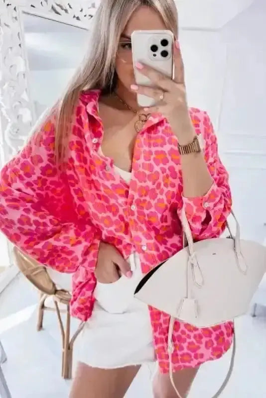 Side view of Leopard Print Button-Up Overshirt showing flutter sleeve detail and comfortable relaxed fit — Fashionfitz