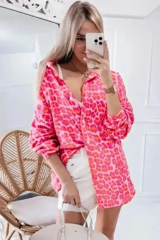 Back view of Leopard Print Button-Up Overshirt showing long sleeves and relaxed open-layer length — Fashionfitz
