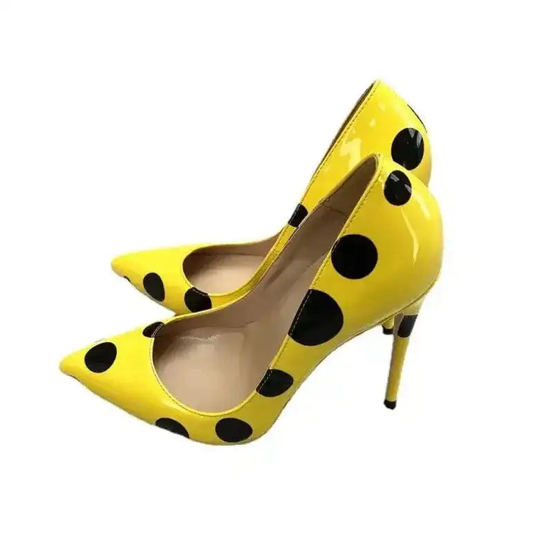 Polka Dot Yellow Stiletto High Heels Shoes with pointed toe and glossy finish, ideal for bold fashion looks. Pumps from FashionFitz collection.